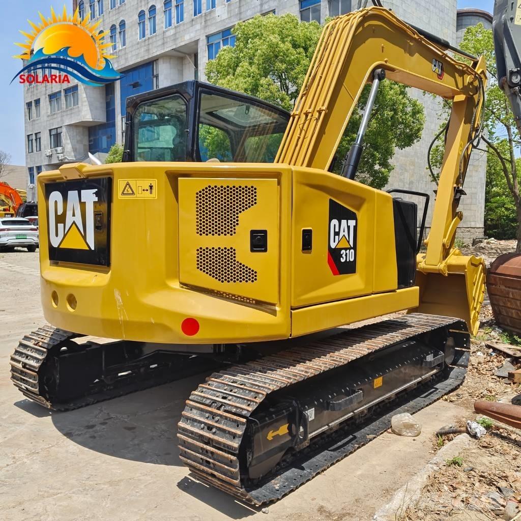 CAT 310 Telakaivukoneet