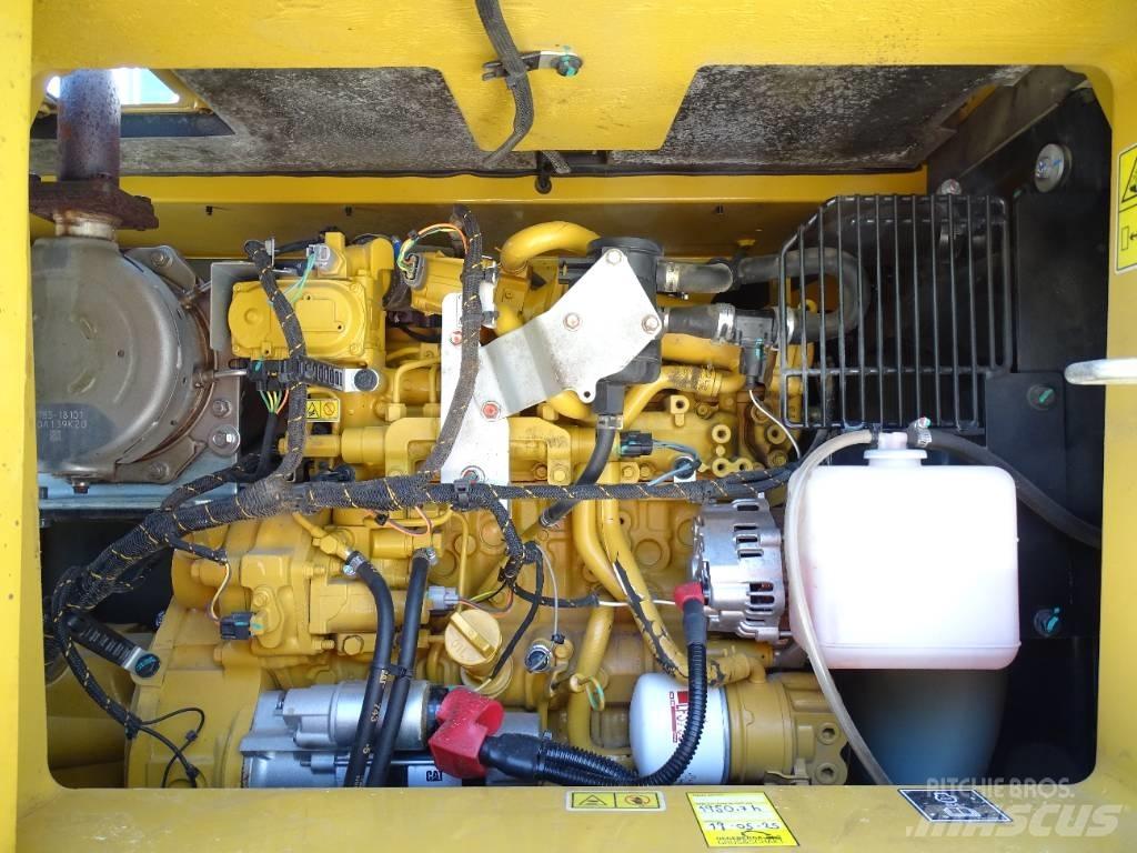 CAT 310 Telakaivukoneet