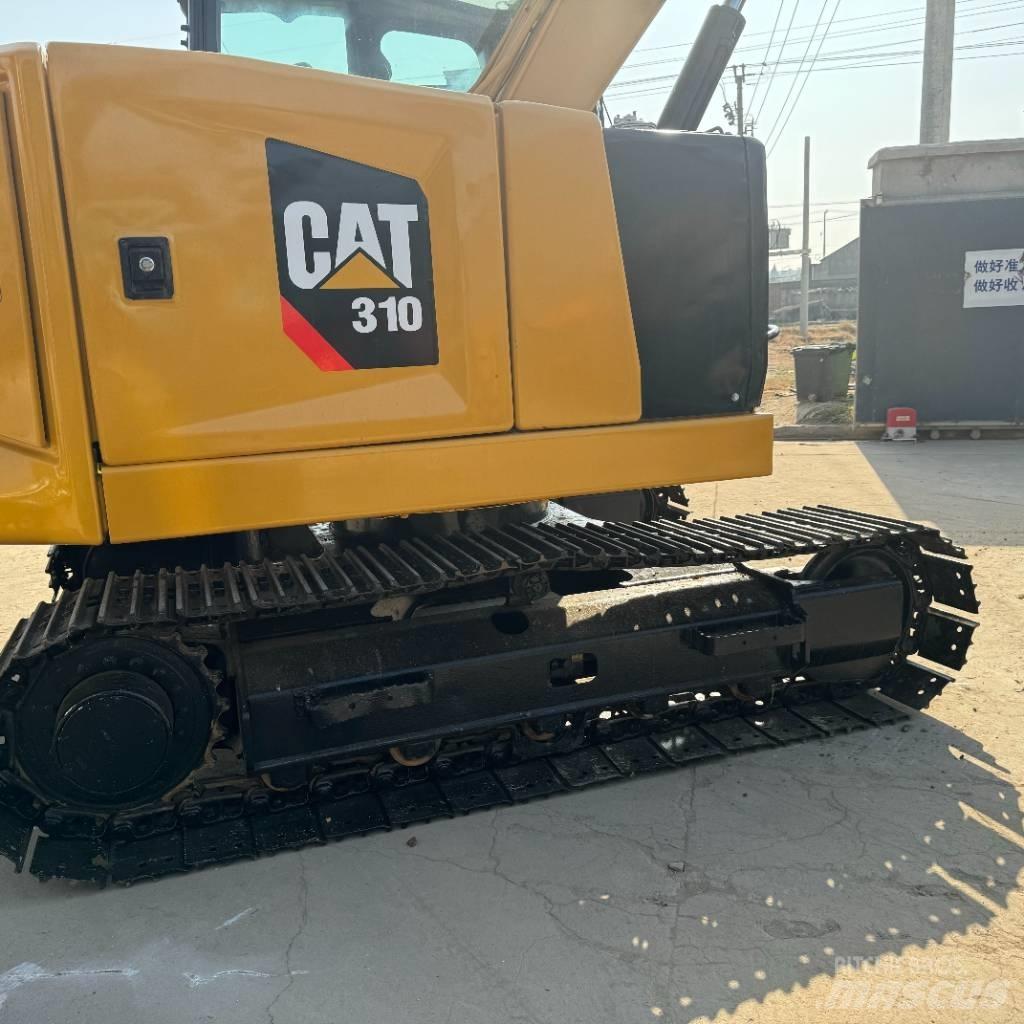 CAT 310 Telakaivukoneet