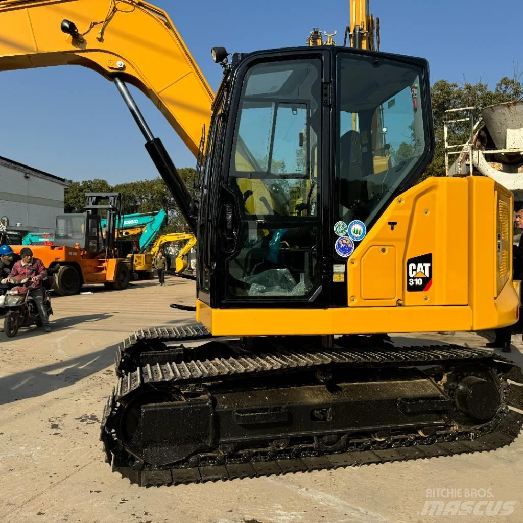 CAT 310 Telakaivukoneet
