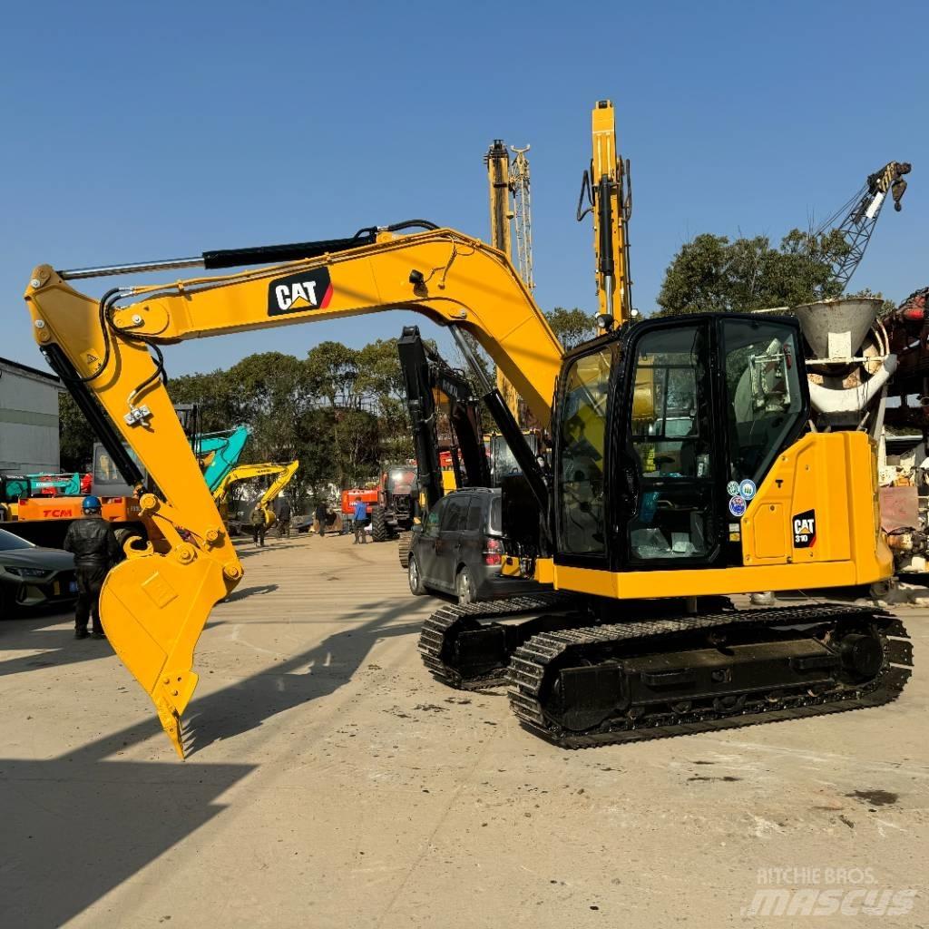 CAT 310 Telakaivukoneet