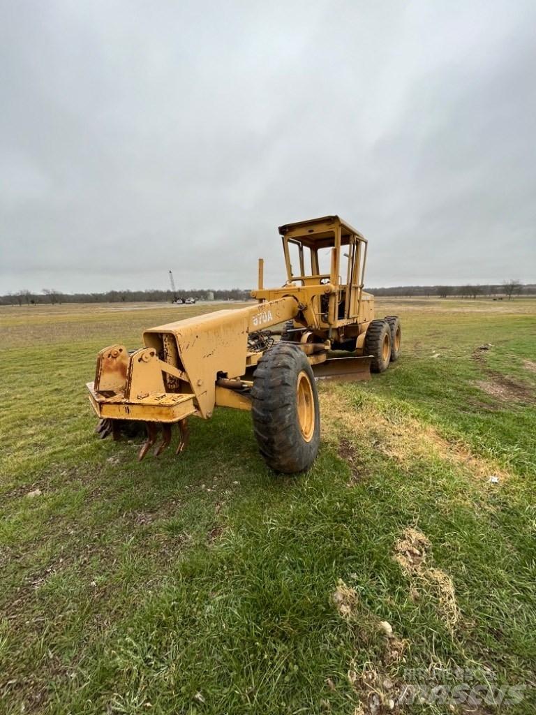 DEERE 570A Tiehöylät