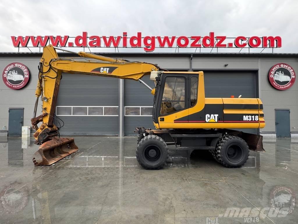 CAT M 318 Pyöräkaivukoneet