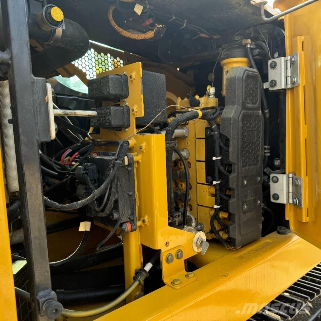 CAT 310 Telakaivukoneet