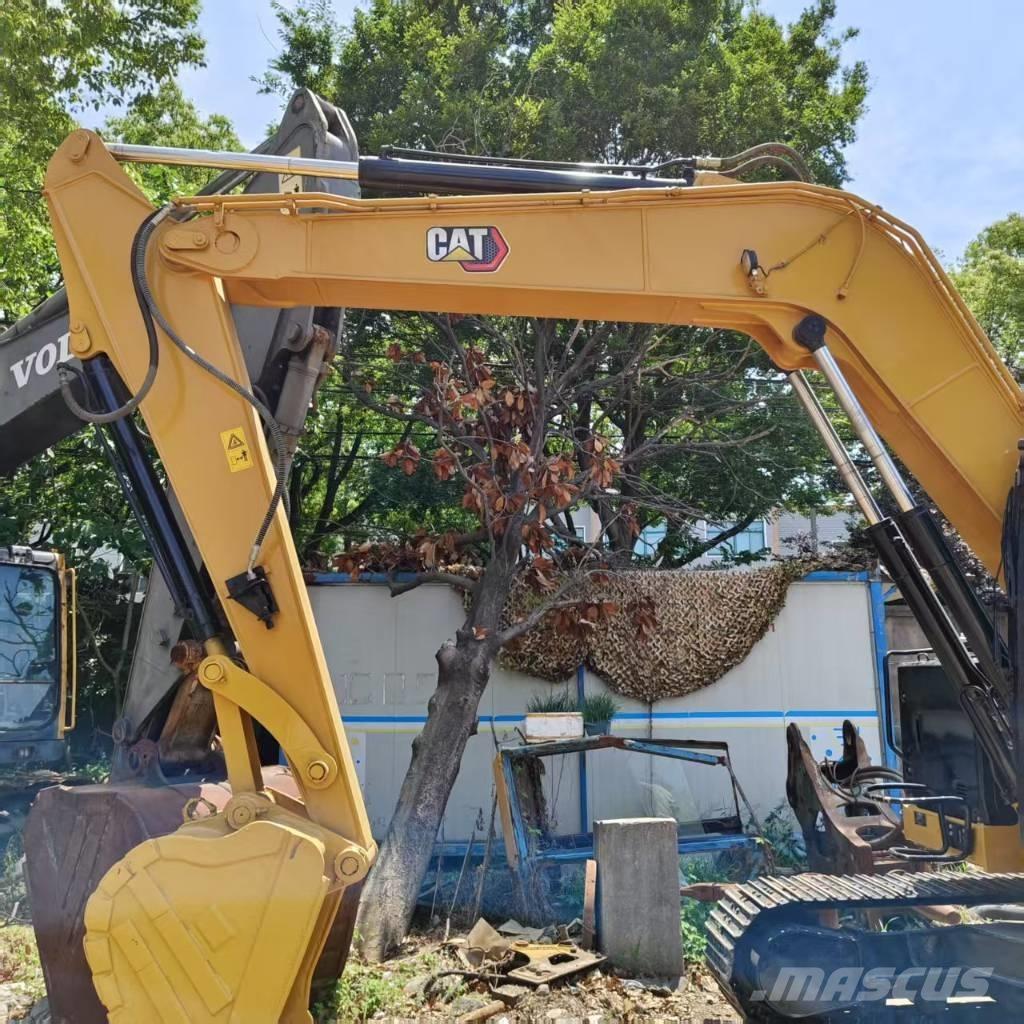 CAT 310 Telakaivukoneet