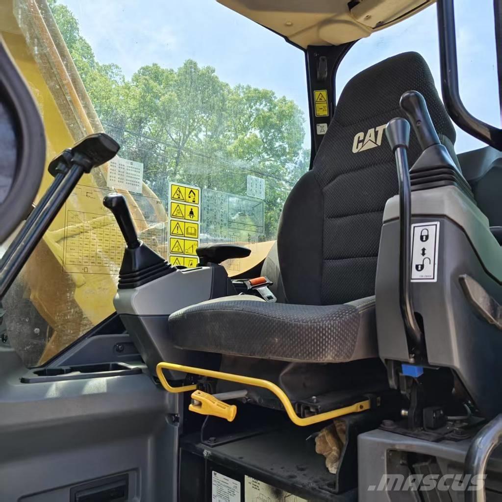 CAT 310 Telakaivukoneet