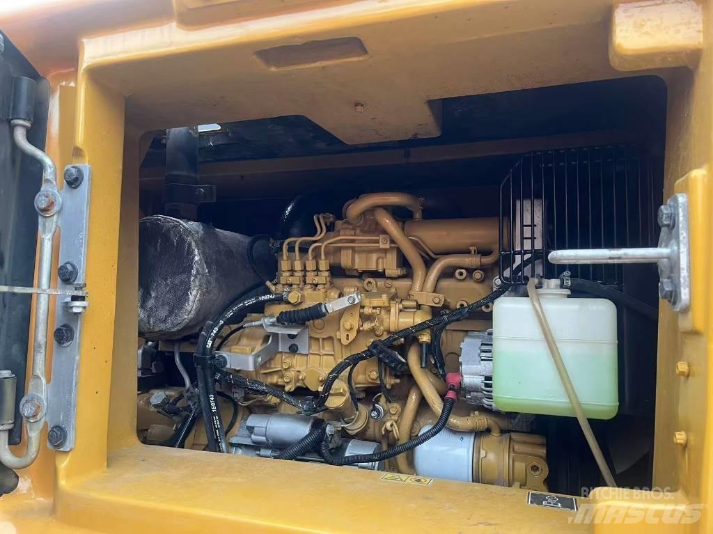 CAT 310 Telakaivukoneet