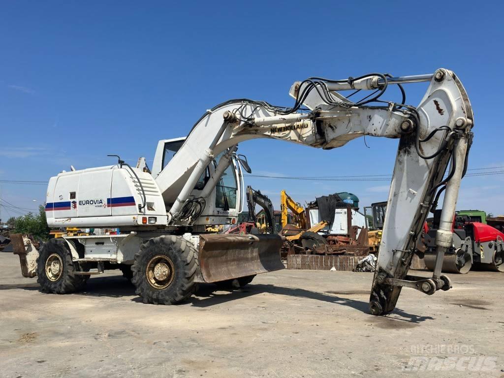 New Holland MH Plus Pyöräkaivukoneet