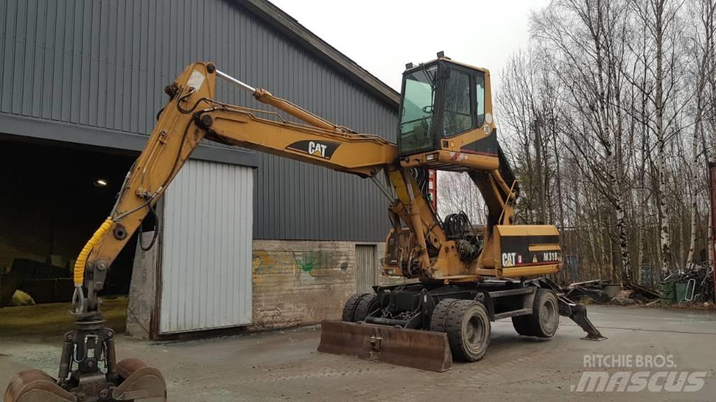 CAT M 318 Jätteenkäsittelijät