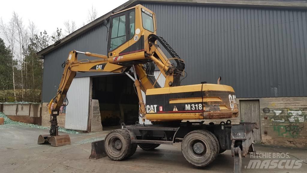 CAT M 318 Jätteenkäsittelijät