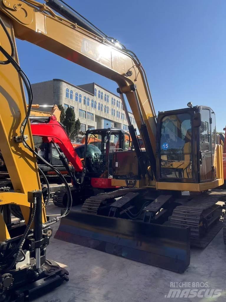 CAT 310 Telakaivukoneet