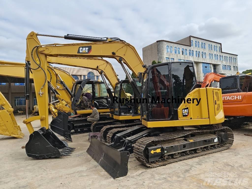 CAT 310 Telakaivukoneet