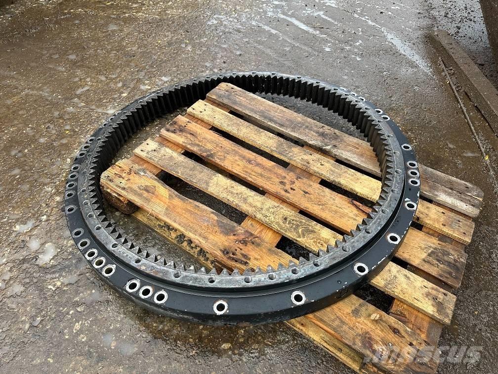 CAT 323 slew ring Akselit