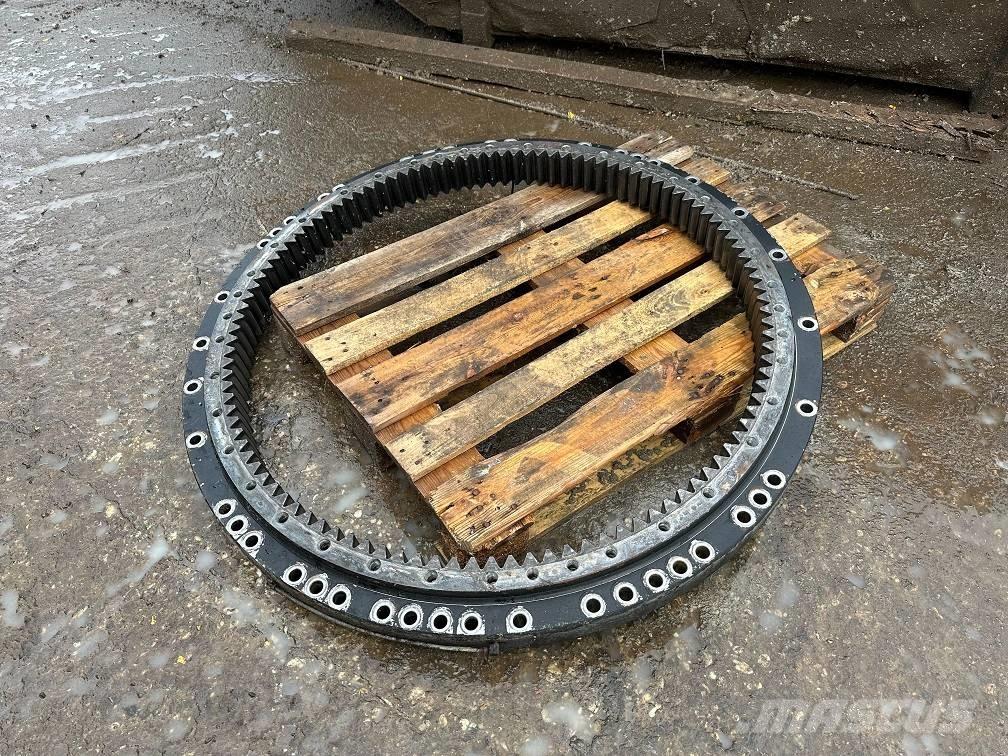 CAT 323 slew ring Akselit