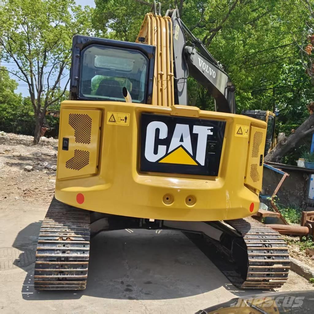 CAT 310 Telakaivukoneet