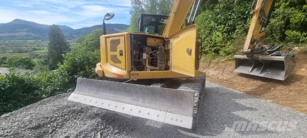 CAT 310 Telakaivukoneet