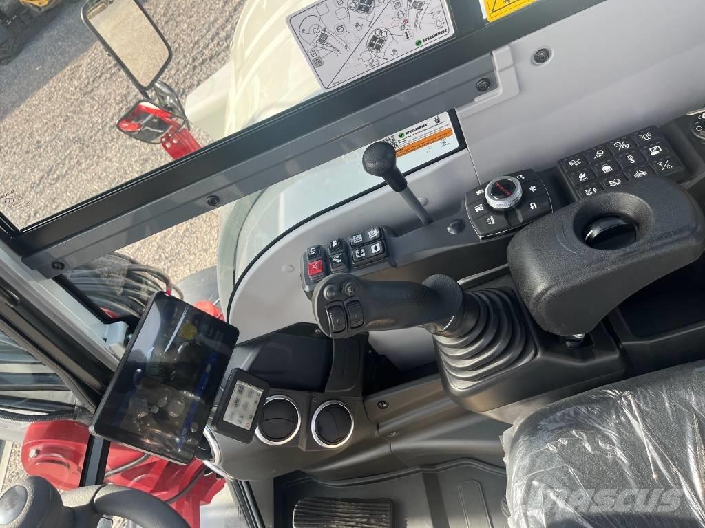 Takeuchi TB 395 W Pyöräkaivukoneet
