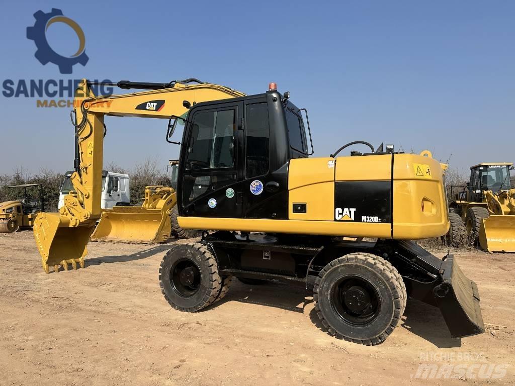 CAT M320D Pyöräkaivukoneet