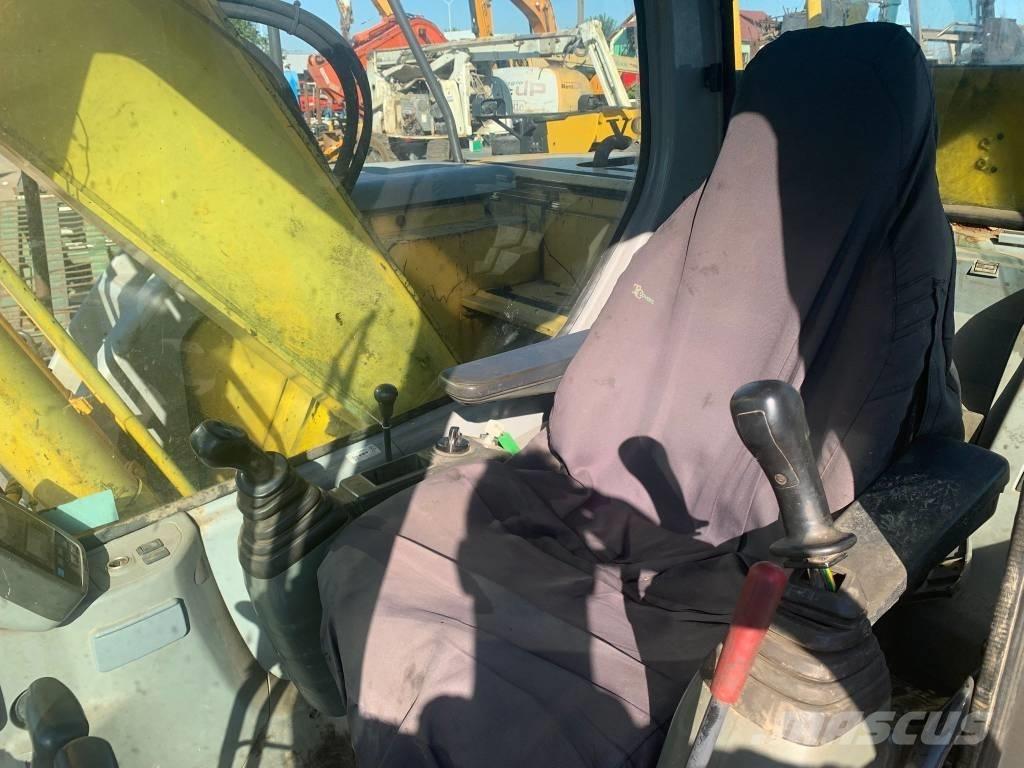 New Holland E 135 SR Telakaivukoneet
