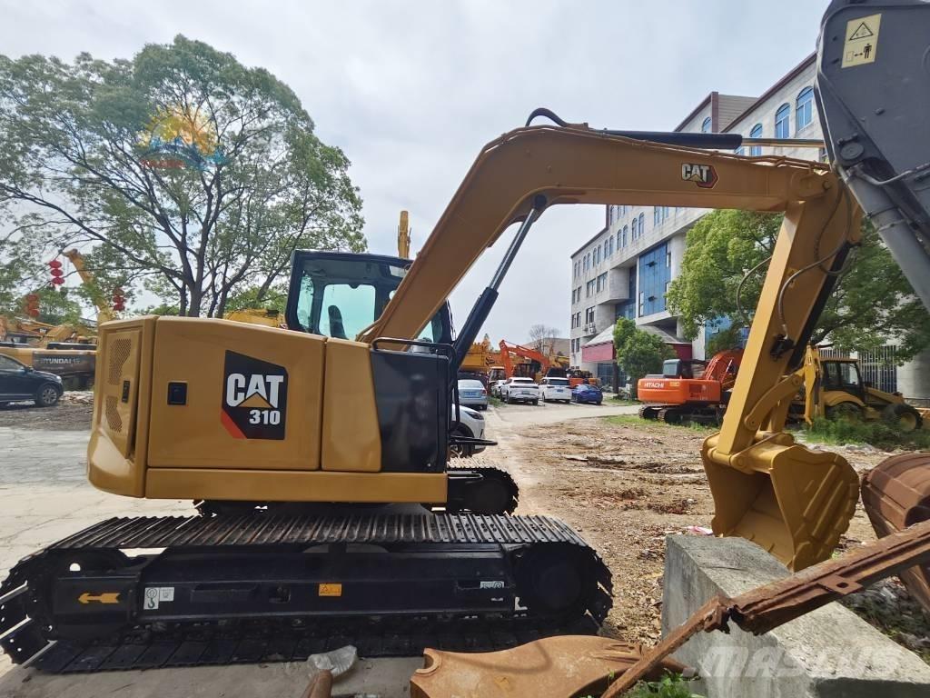 CAT 310 Telakaivukoneet