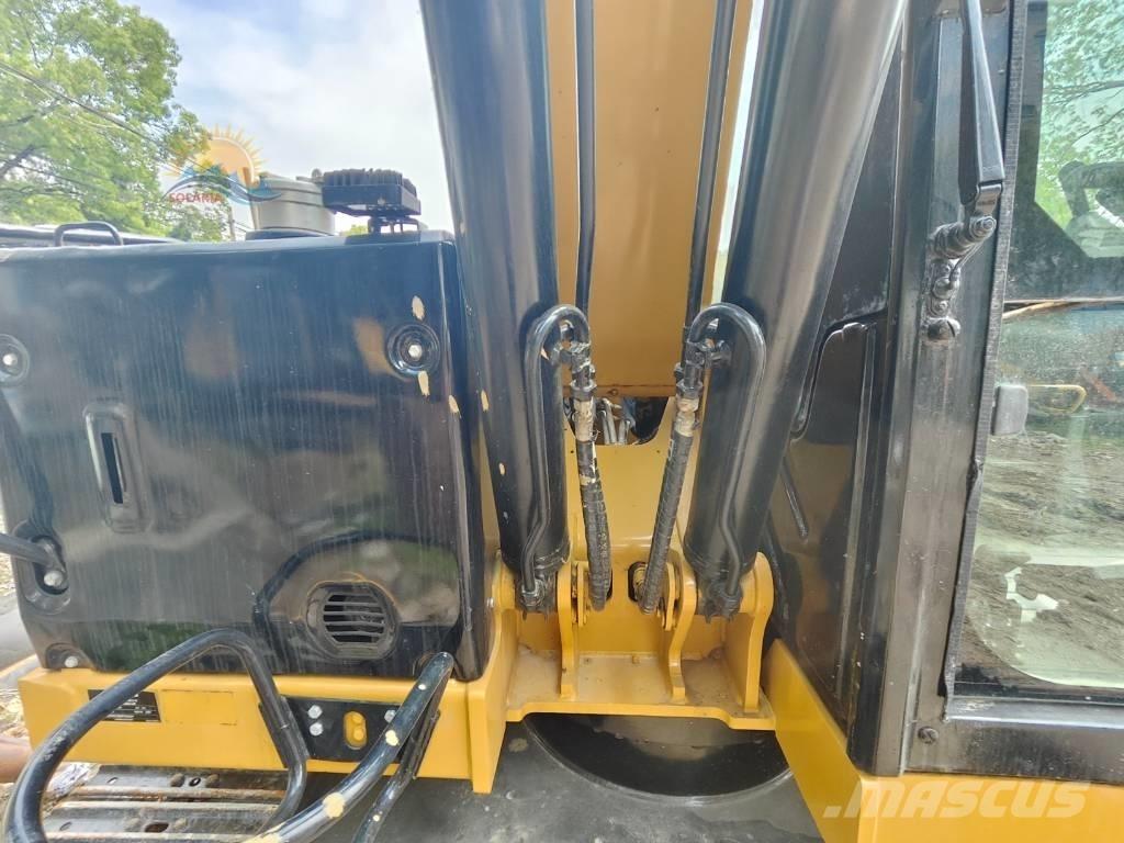 CAT 310 Telakaivukoneet