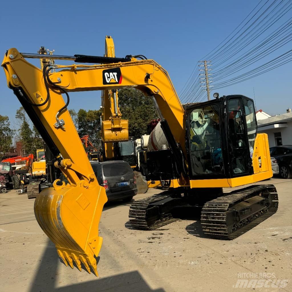 CAT 310 Telakaivukoneet