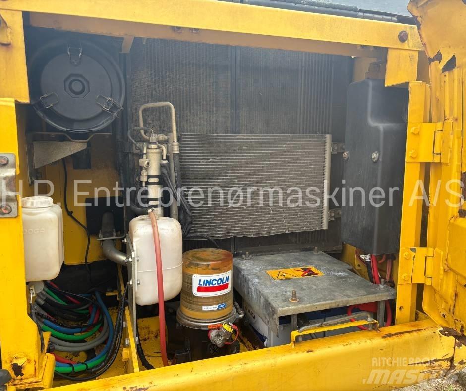 New Holland E 135 B Telakaivukoneet