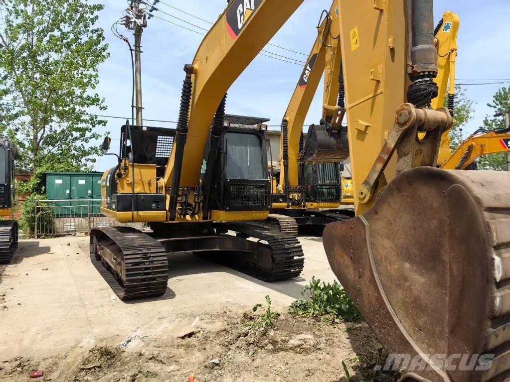 CAT 323 D Telakaivukoneet