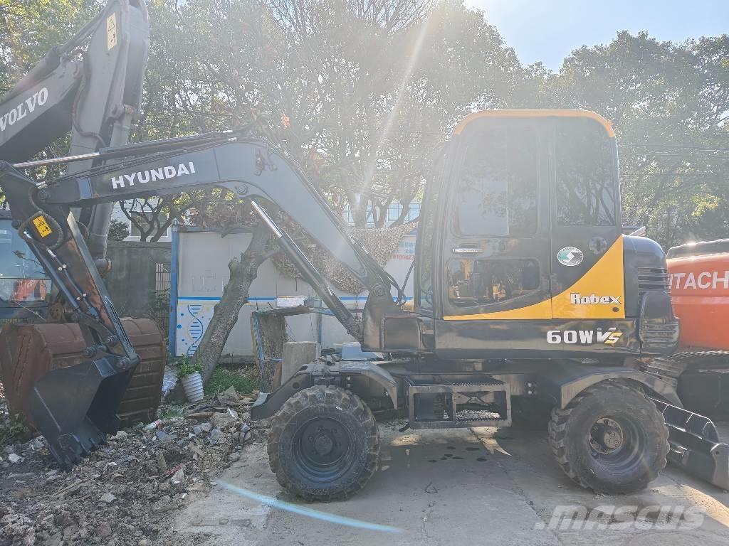 Hyundai 60 W VS Minikaivukoneet < 7t