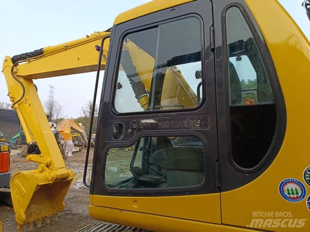Komatsu PC120 Midikaivukoneet 7t - 12t