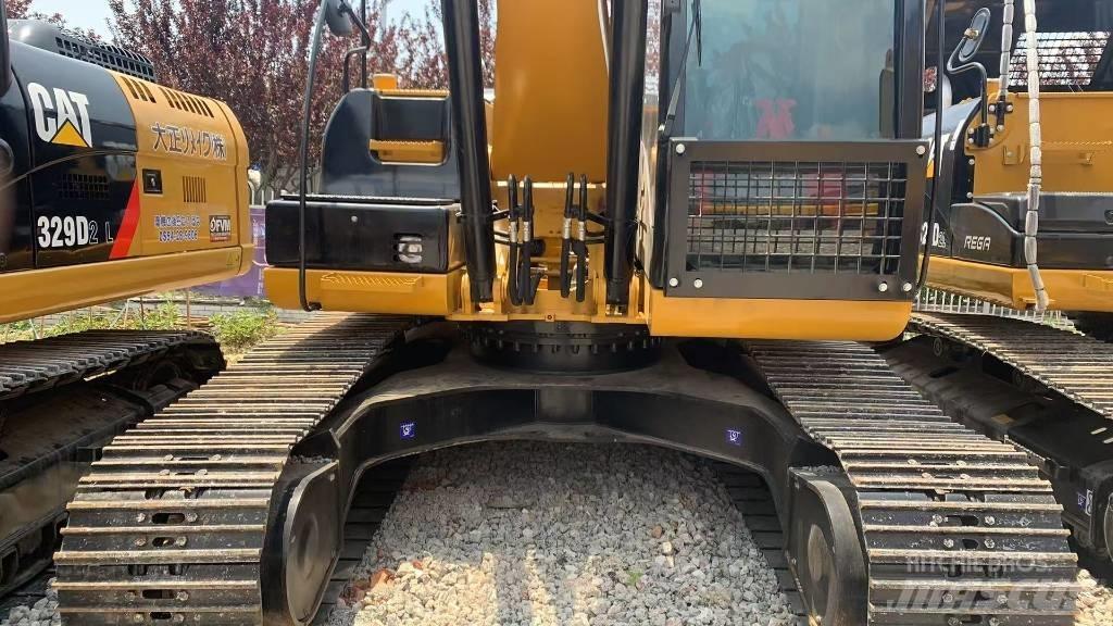 CAT 323 Telakaivukoneet