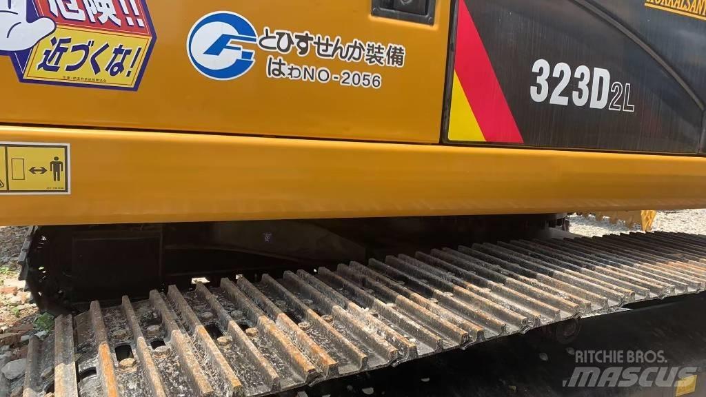 CAT 323 Telakaivukoneet