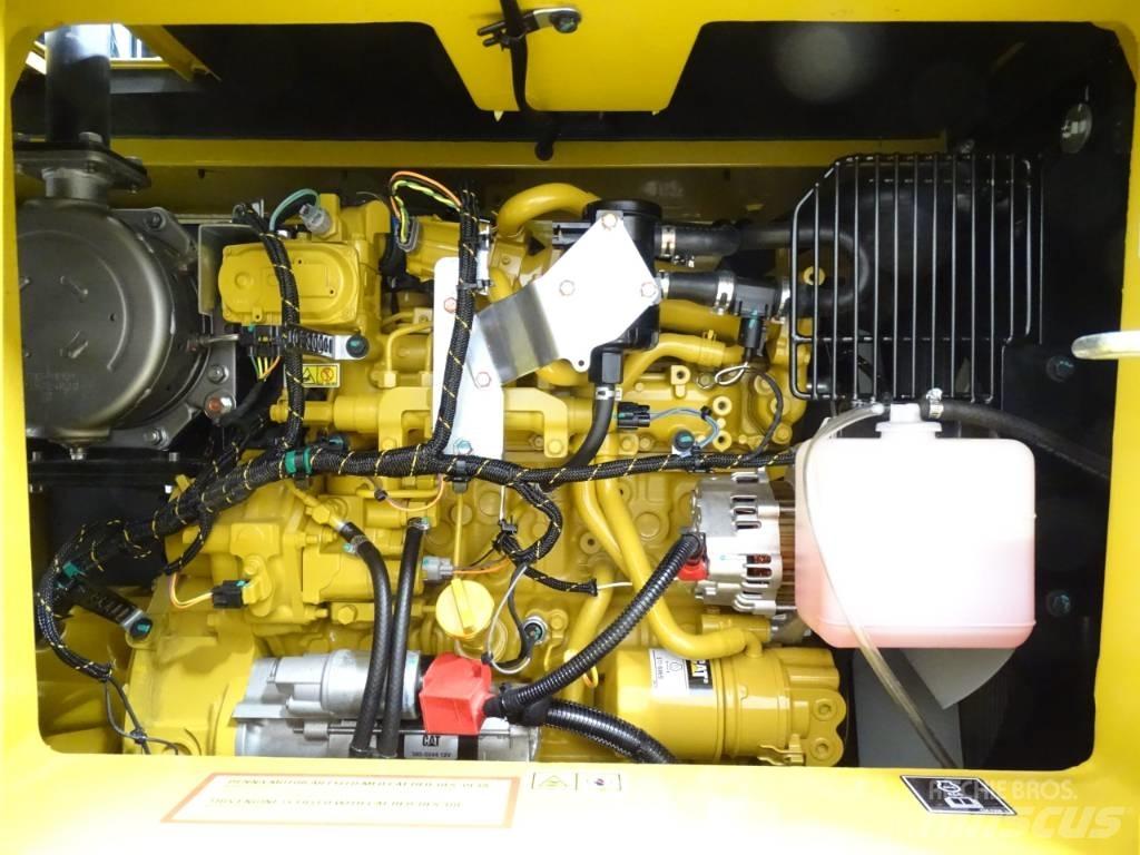 CAT 310 Telakaivukoneet