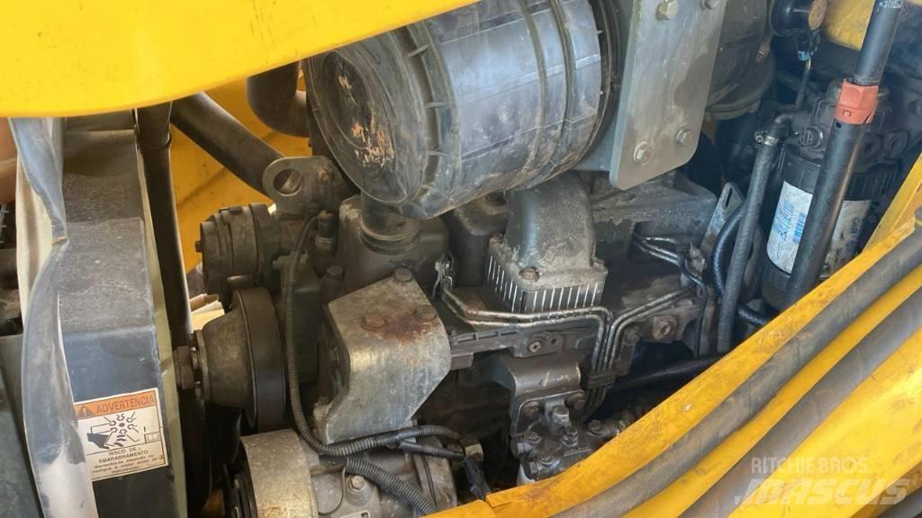 New Holland B 95 B Kaivurikuormaajat