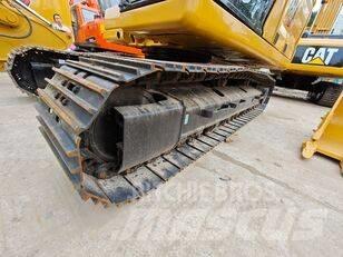 CAT 323 Telakaivukoneet