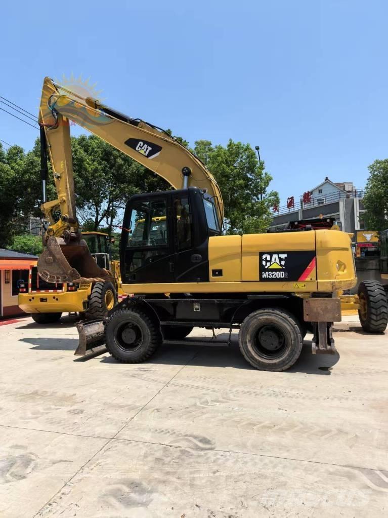CAT M 320D2 Pyöräkaivukoneet