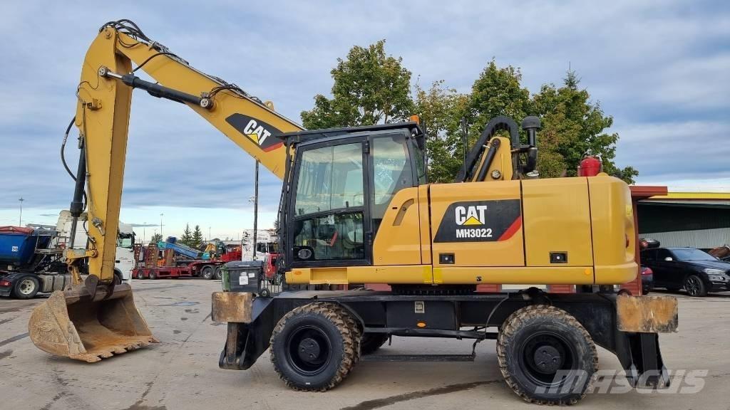 CAT MH 3022 Jätteenkäsittelijät