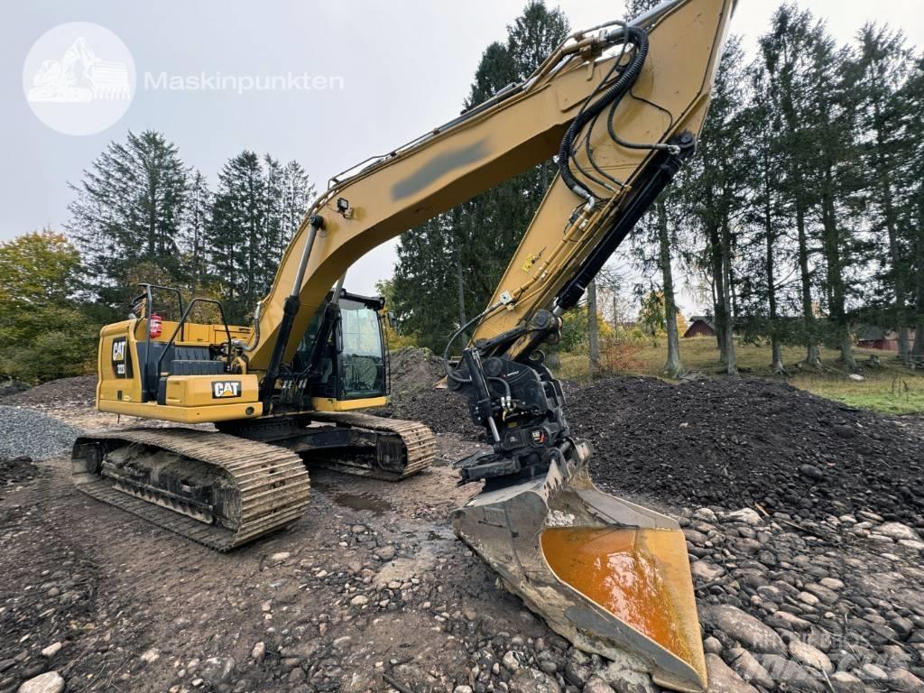 CAT 323 Telakaivukoneet
