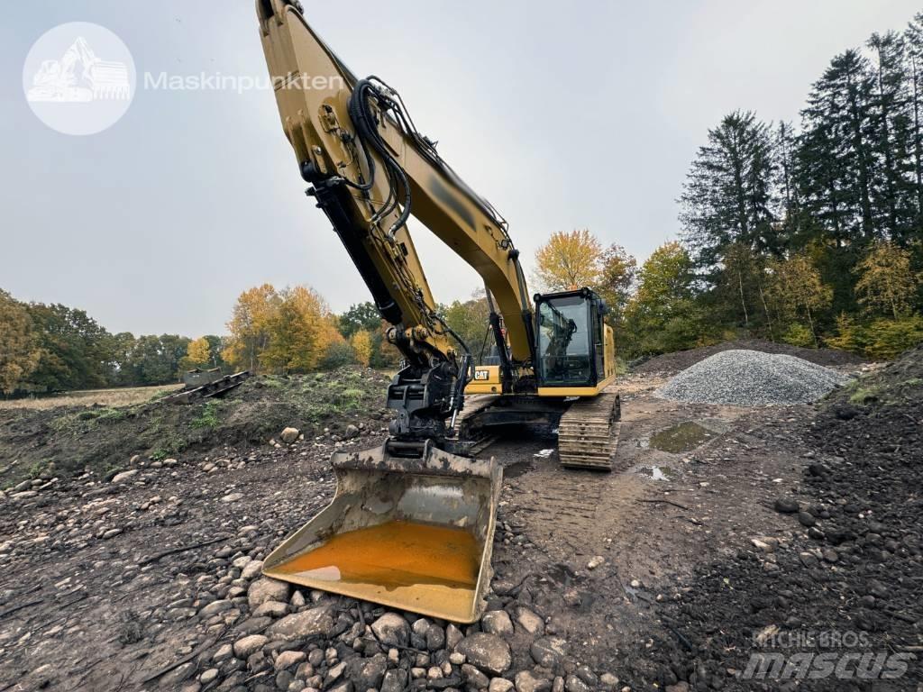 CAT 323 Telakaivukoneet