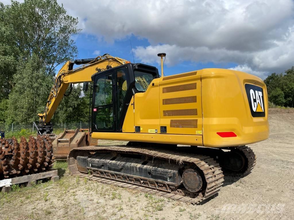 CAT 323 Telakaivukoneet