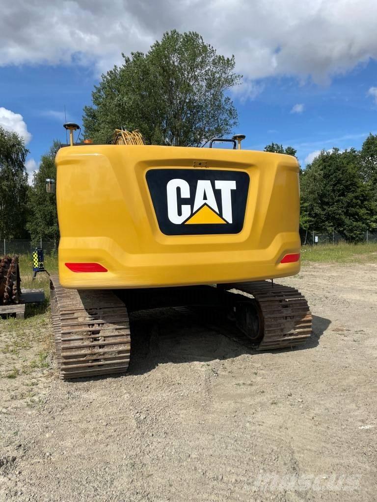 CAT 323 Telakaivukoneet