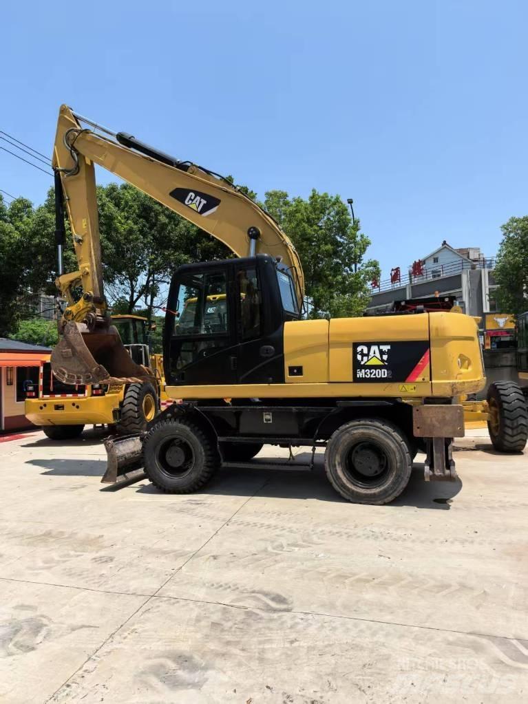CAT M 320 Pyöräkaivukoneet
