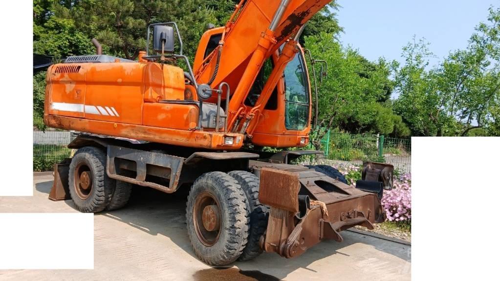 Doosan DX 210 W Pyöräkaivukoneet