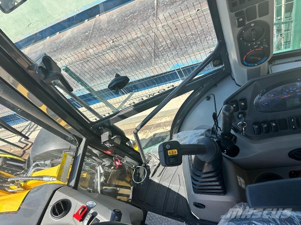 New Holland B 115 B Kaivurikuormaajat