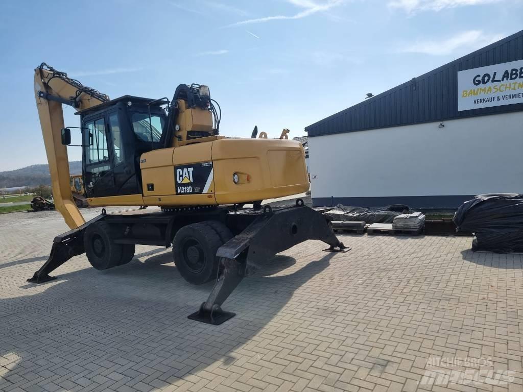 CAT 318D Jätteenkäsittelijät