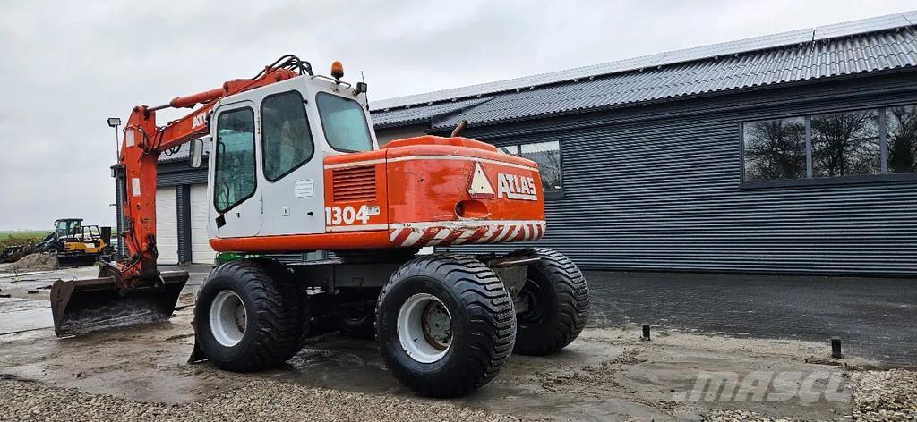 Atlas 1304 Pyöräkaivukoneet