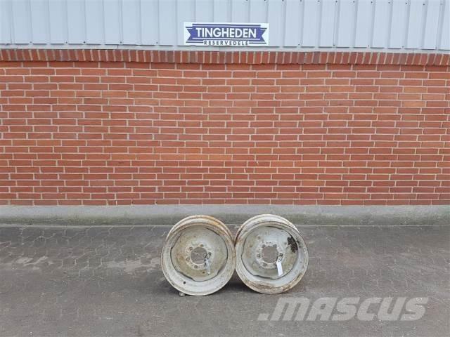  18 5.50FX18 Renkaat ja vanteet