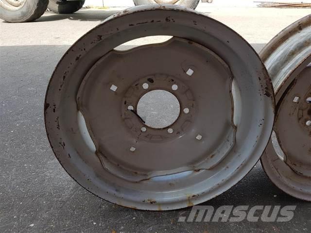  18 5.50FX18 Renkaat ja vanteet