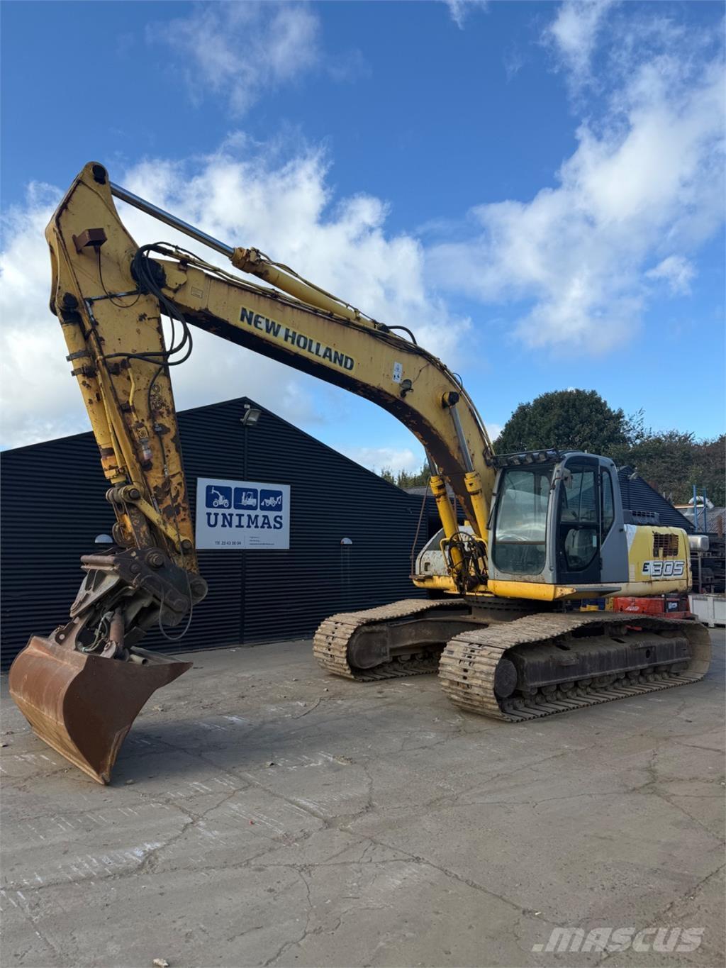 New Holland E305 Telakaivukoneet