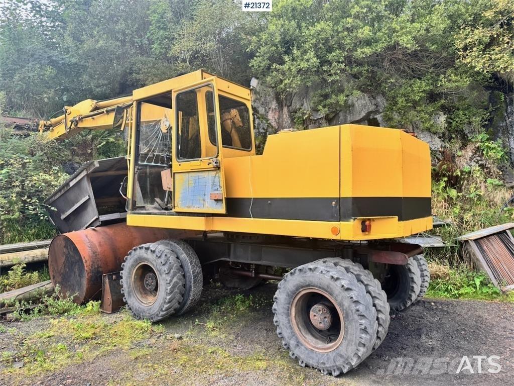 CAT 212B Pyöräkaivukoneet
